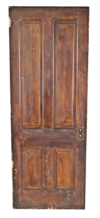 late 1860's or early 1870's original interior tenement passage door comprised of painted pine wood with four raised panels divided by the lock rail