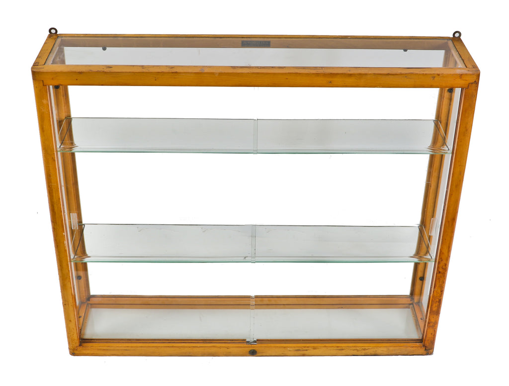 original and intact wall-mount early 1930's american depression-era waddell varnished maple wood compact display case with plate glass sliding doors and adjustable shelves