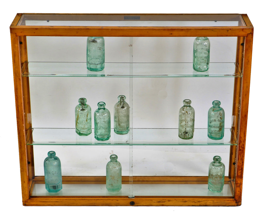 original and intact wall-mount early 1930's american depression-era waddell varnished maple wood compact display case with plate glass sliding doors and adjustable shelves