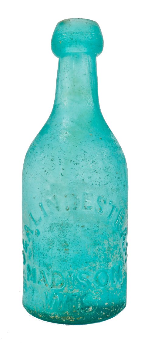 rare all original c. 1850's well-documented light blue blue early wisconsin iron-pontiled j. & a. lindestram embossed soda or mineral water bottle with kick up base encrusted with residual iron oxide