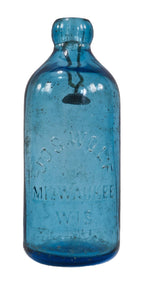rare mid-nineteenth century privy-dug sapphire hutchinson soda bottle manufactured for jos wolf in milwaukee, wisconsin.