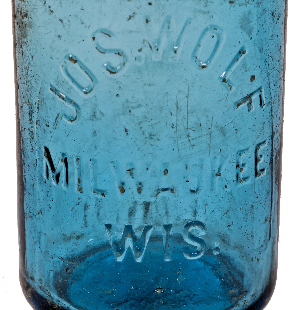 rare mid-nineteenth century privy-dug sapphire hutchinson soda bottle manufactured for jos wolf in milwaukee, wisconsin.