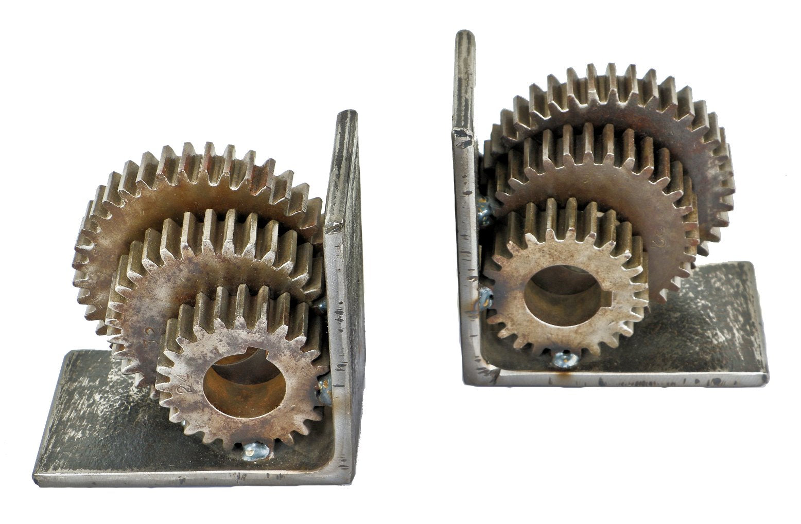 matching set american industrial repurposed stationary brushed and welded solid steel vintage sprocket or gear bookends with angled steel brackets