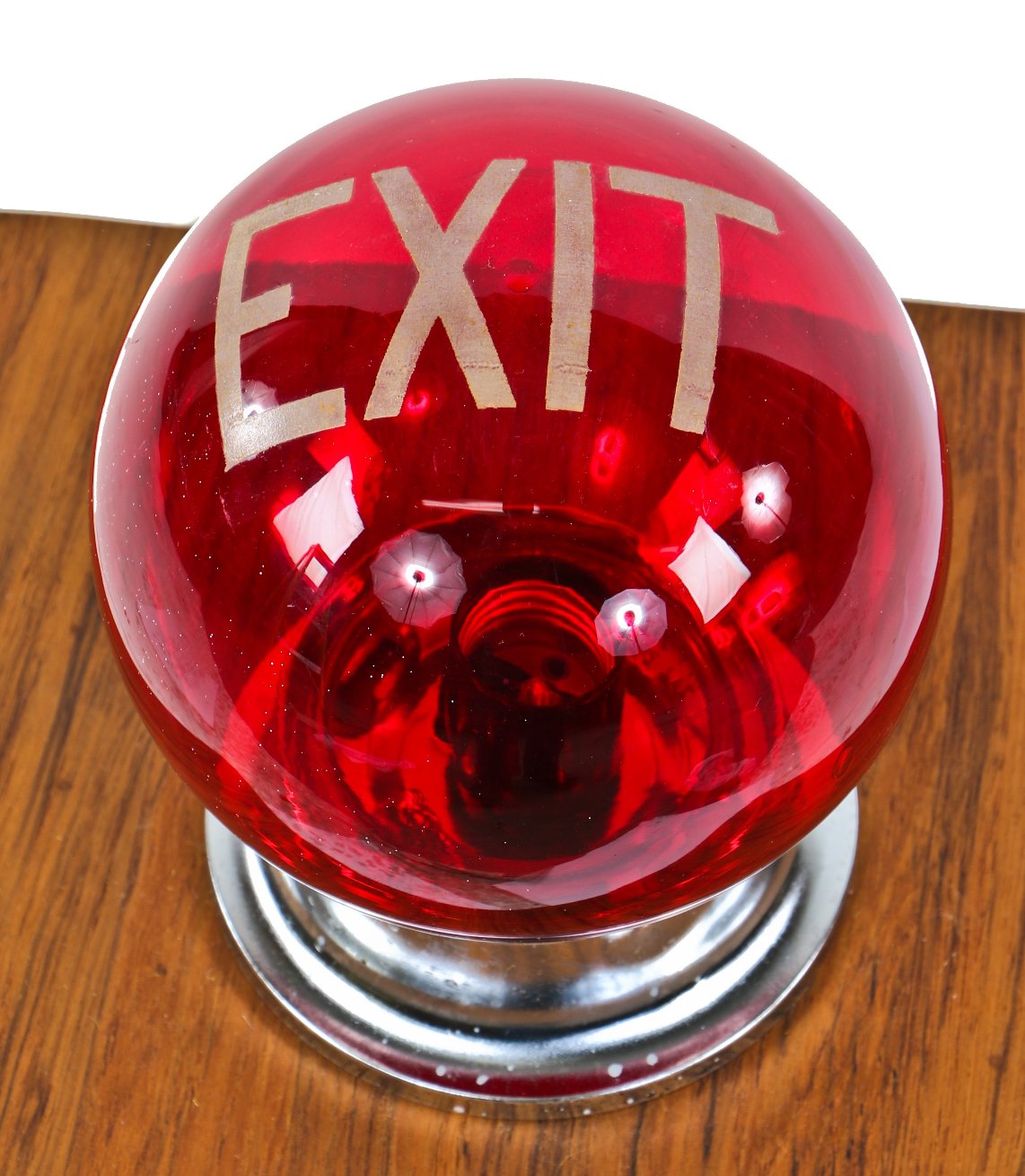 single original depression era ruby red glass baked-on white enameled hotel wall-mount illuminated exit light sconce with polished chrome shade fitter