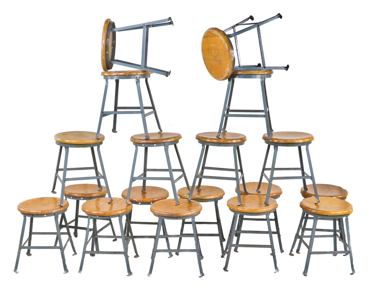 large lot of 18 matching all original american vintage industrial detroit automotive assembly plant angled and riveted joint steel stools with solid maple seats