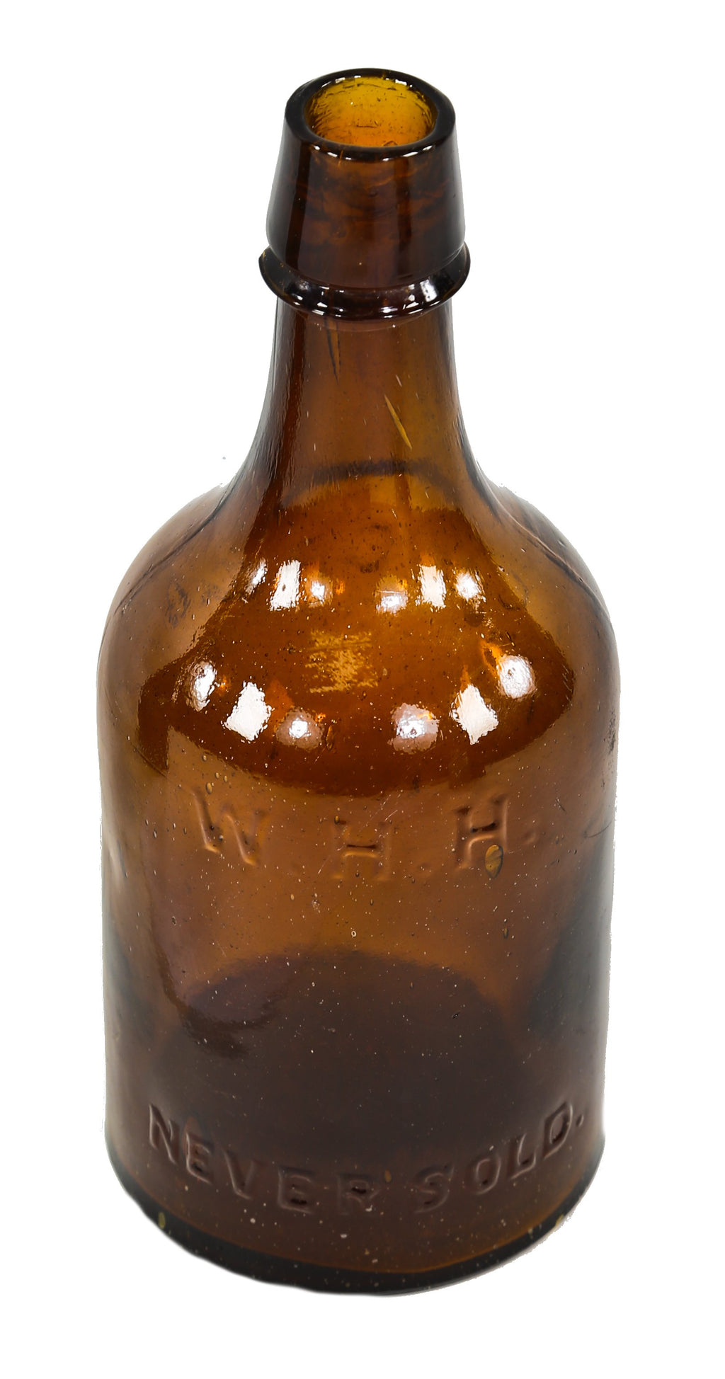 original and intact c. 1865-75 hard to find antique american amber glass squat quart ale bottle manufactured for william h. hutchinson bottling works.