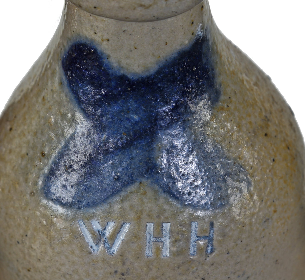 exceptionally rare c. late 1850's salt glazed beer or cider stoneware bottle with cobalt blue "x" manufactured for chicago bottler william henry hutchinson.