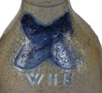 exceptionally rare c. late 1850's salt glazed beer or cider stoneware bottle with cobalt blue "x" manufactured for chicago bottler william henry hutchinson.