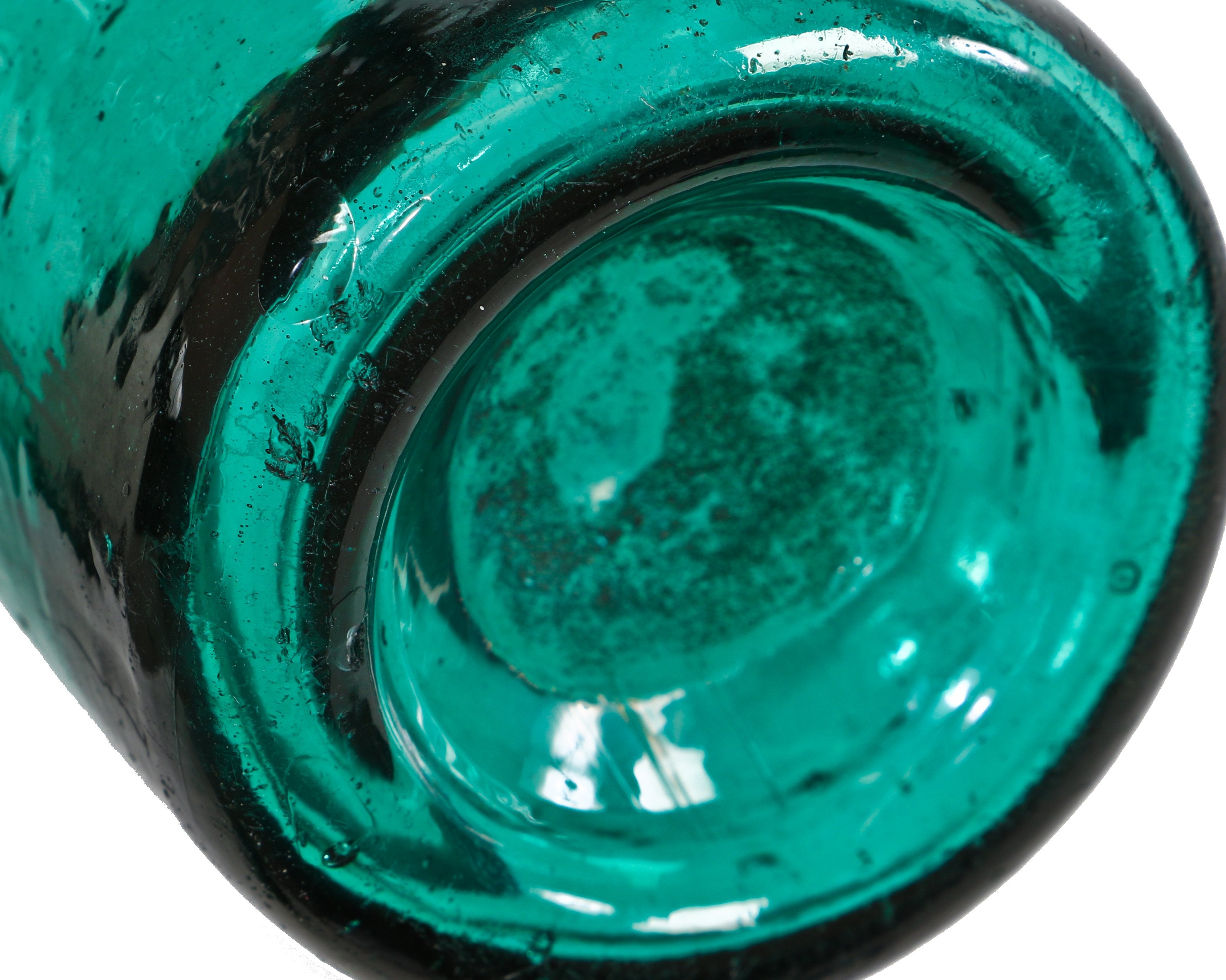 very rare intact and all original c. 1840's antique american iron pontiled vibrant teal colored mineral water privy dug glass bottle manufactured for philadelphia bottler cornelius jones.