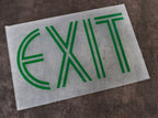 original "new old stock" c. 1930's american depression era art deco streamlined style frosted glass exit panel with intact baked-on green enameled finish