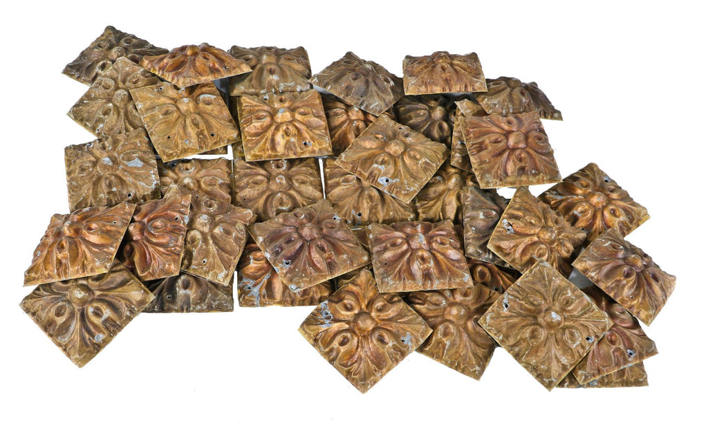 original late 19th or early 20th century intact deeply embossed diminutive stamped ornamental schlitz beer saloon interior ceiling tiles with intact metallic gold enameled finish