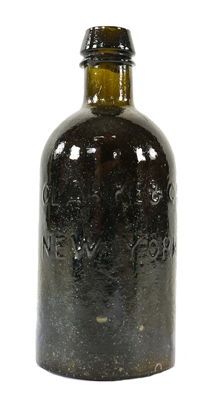 single rare mid-nineteenth century antique american black glass saratoga pint bottle manufactured for clarke & co, new york