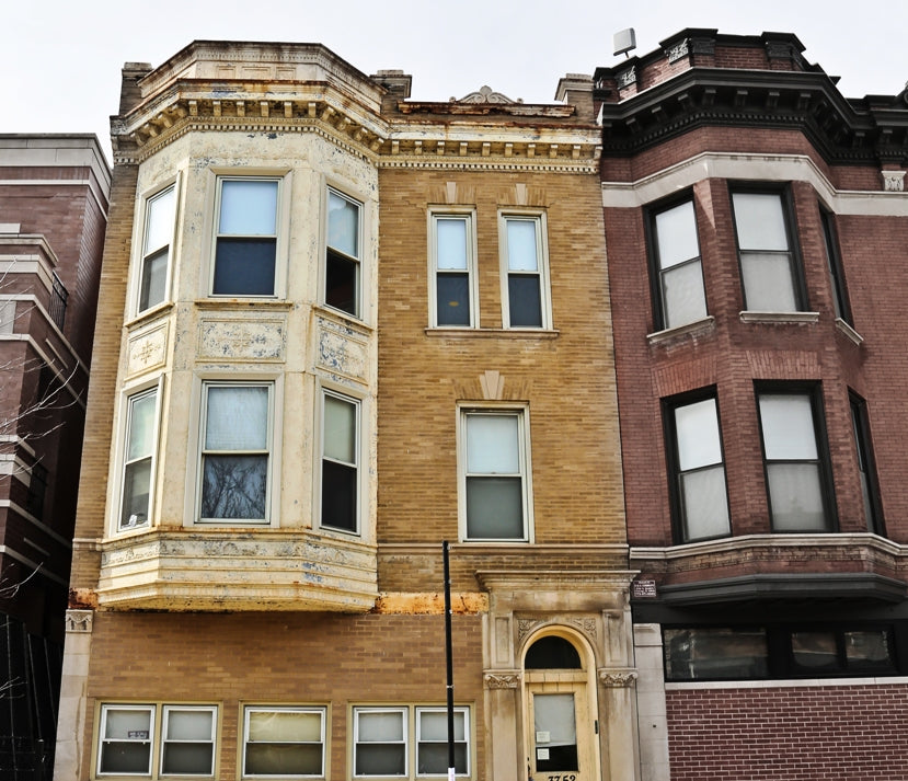 original well-maintained early 20th century varnished quartered oak wood interior residential front parlor fireplace mantel with solid round columns