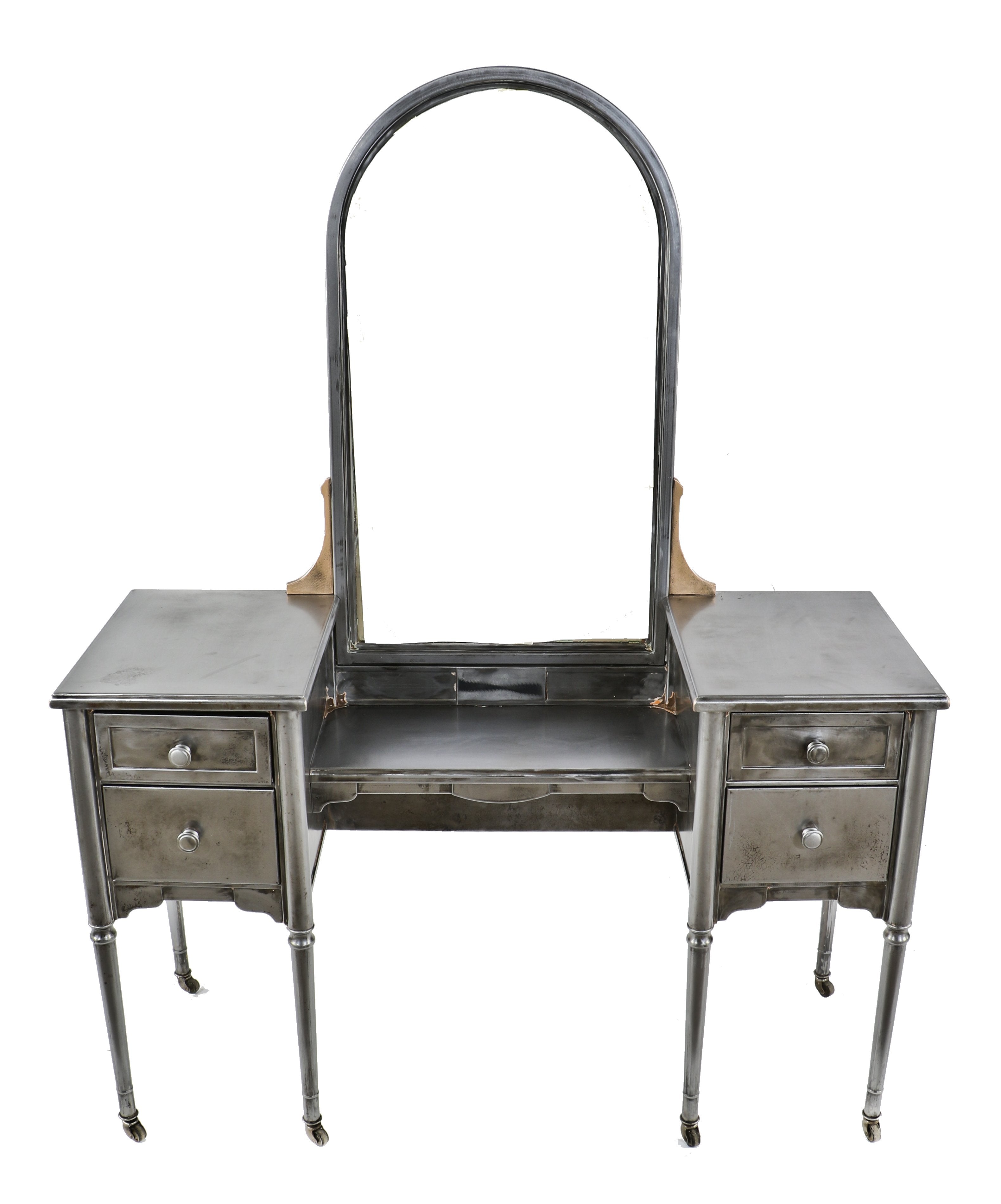 original c. 1930's completely refinished pressed and folded turned and tapered brushed steel "simmons" vanity with original tilting arch top mirror