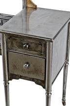 original c. 1930's completely refinished pressed and folded turned and tapered brushed steel "simmons" vanity with original tilting arch top mirror