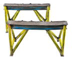 two matching incredibly heavy duty original late 1930's american industrial weathered and worn painted all-welded joint foundry steel sawhorse bases
