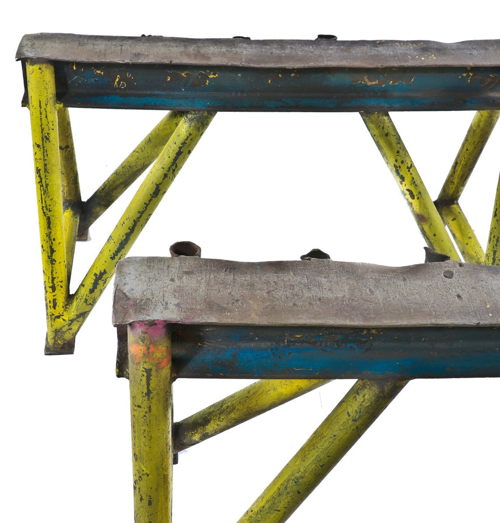 two matching incredibly heavy duty original late 1930's american industrial weathered and worn painted all-welded joint foundry steel sawhorse bases