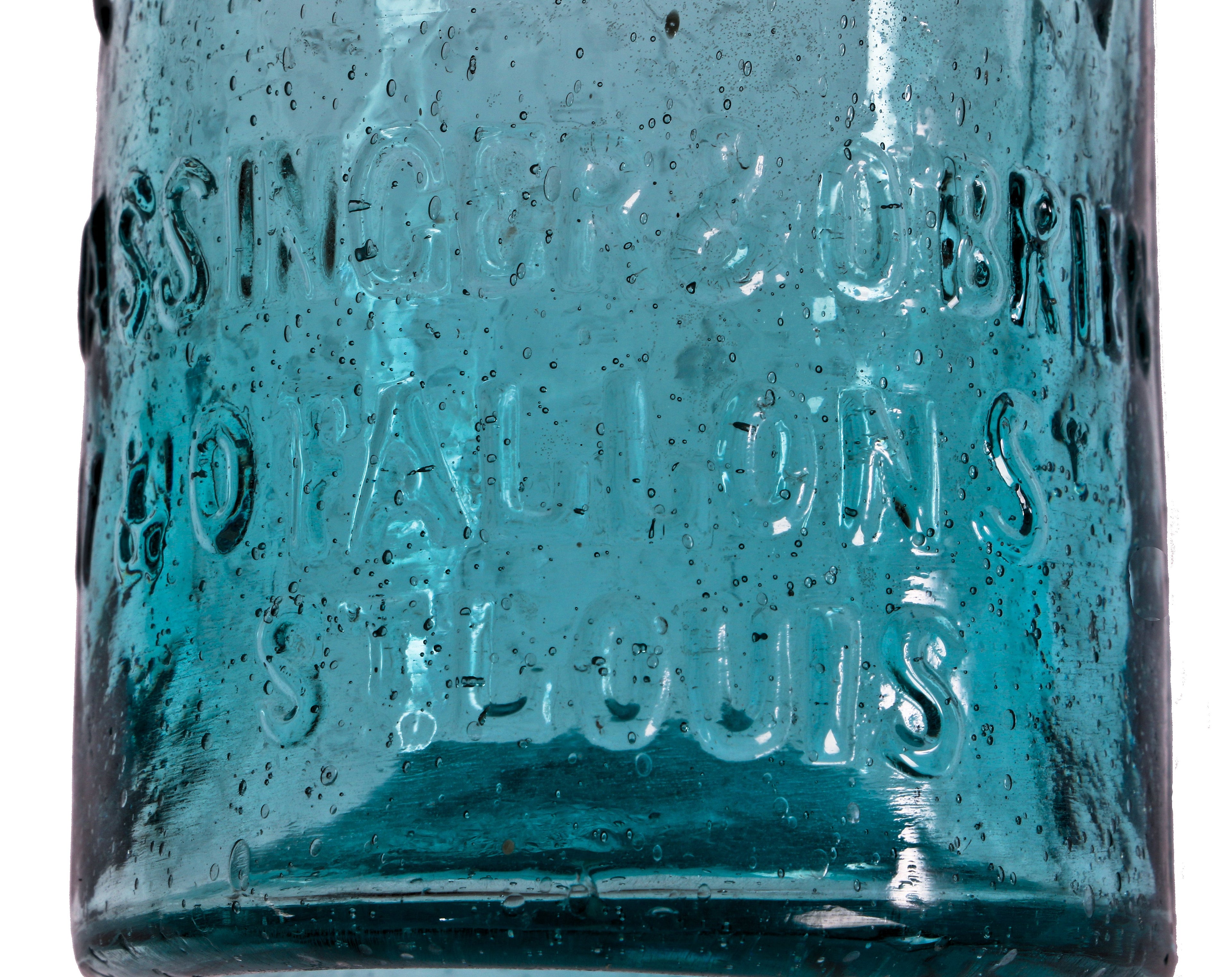 crude mid-19th century vibrantly colored aqua blue soda bottle with applied rounded collar manufactured for hassinger & o'brien in st. louis, mo.