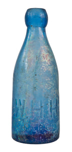 original and intact 19th century chicago privy dug uncleaned cobalt blue william h. hutchinson soda water bottle with a large embossed "h" on the base