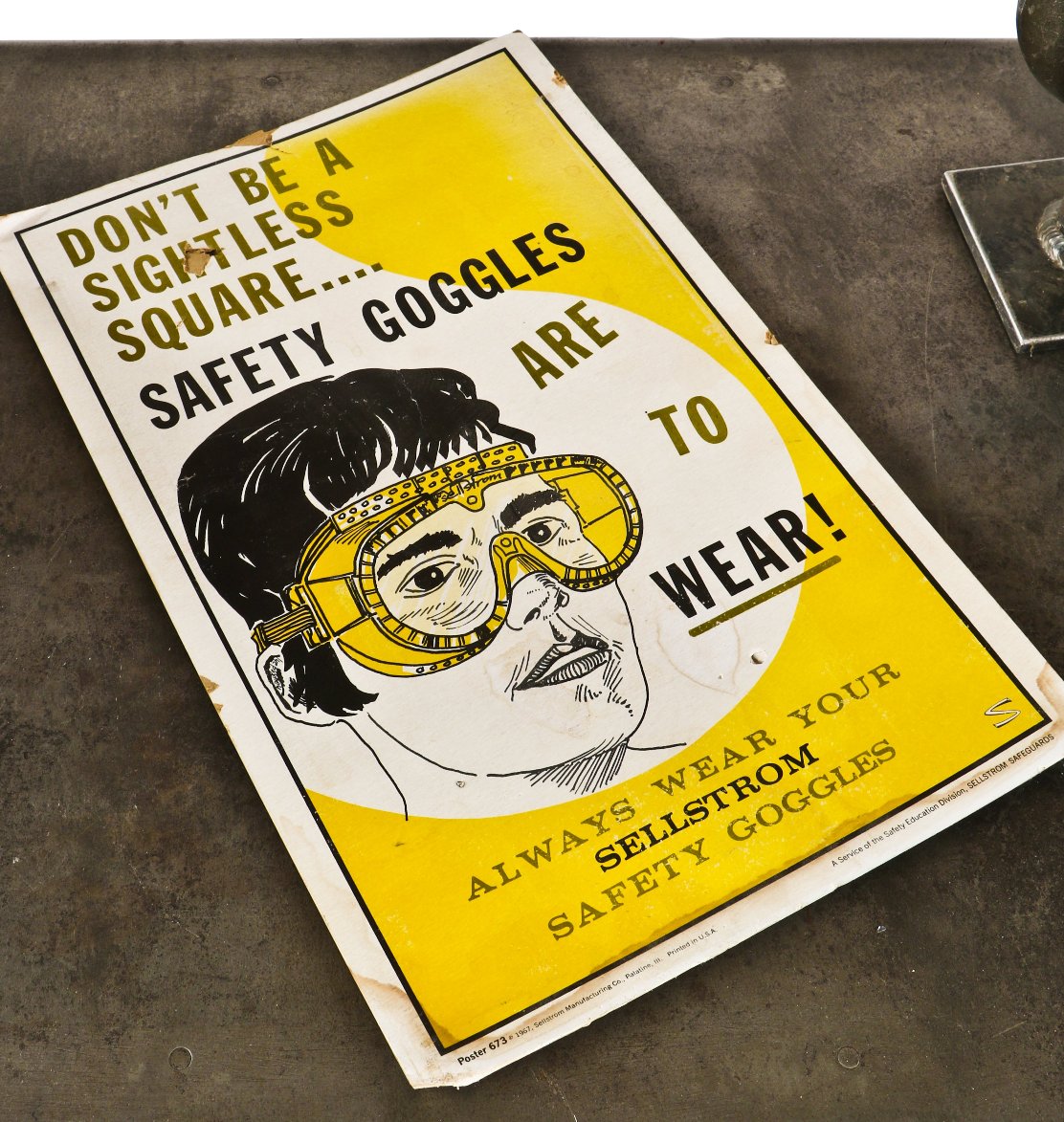 original c. 1960's american industrial wall-mount die cut "don't be a sightless square" factory machine shop sellstrom safety goggle sign with graphics