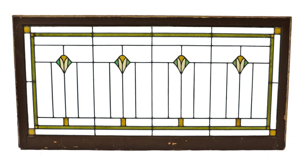 remarkable oversized c. 1920's craftsman or prairie style chicago bungalow oversized transom art glass window with a repeating floral design motif