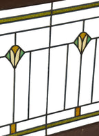 remarkable oversized c. 1920's craftsman or prairie style chicago bungalow oversized transom art glass window with a repeating floral design motif