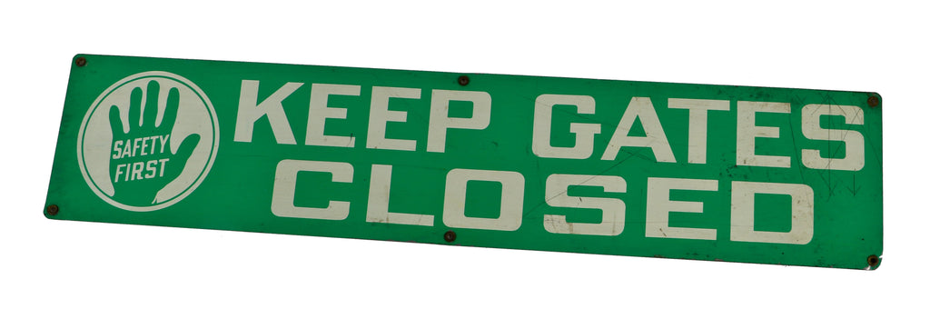 original single-sided baked-on green enameled "keep gates closed" safety first sign salvaged from a standard oil (of indiana) factory