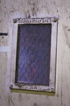 original c. 1910-15 antique american industrial intact freight elevator diminutive bi-fiold door window or portal with thick "chicken wire" glass