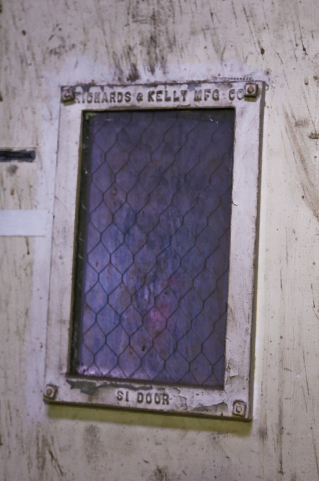 original c. 1910-15 antique american industrial intact freight elevator diminutive bi-fiold door window or portal with thick "chicken wire" glass