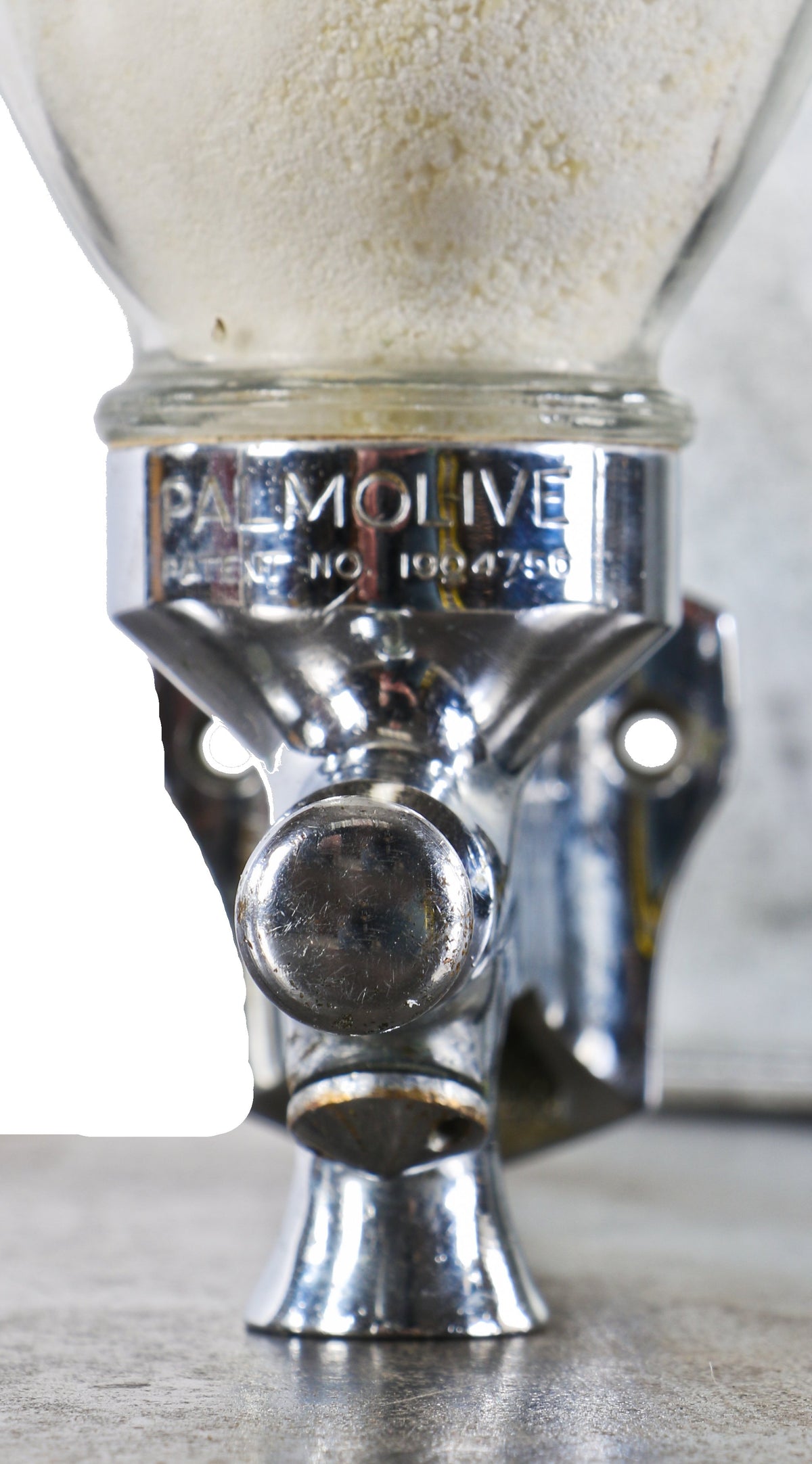 fully functional single-pump action c. 1930's american industrial wall-mount commercial building lavatory "palmolive" brand soap dispenser