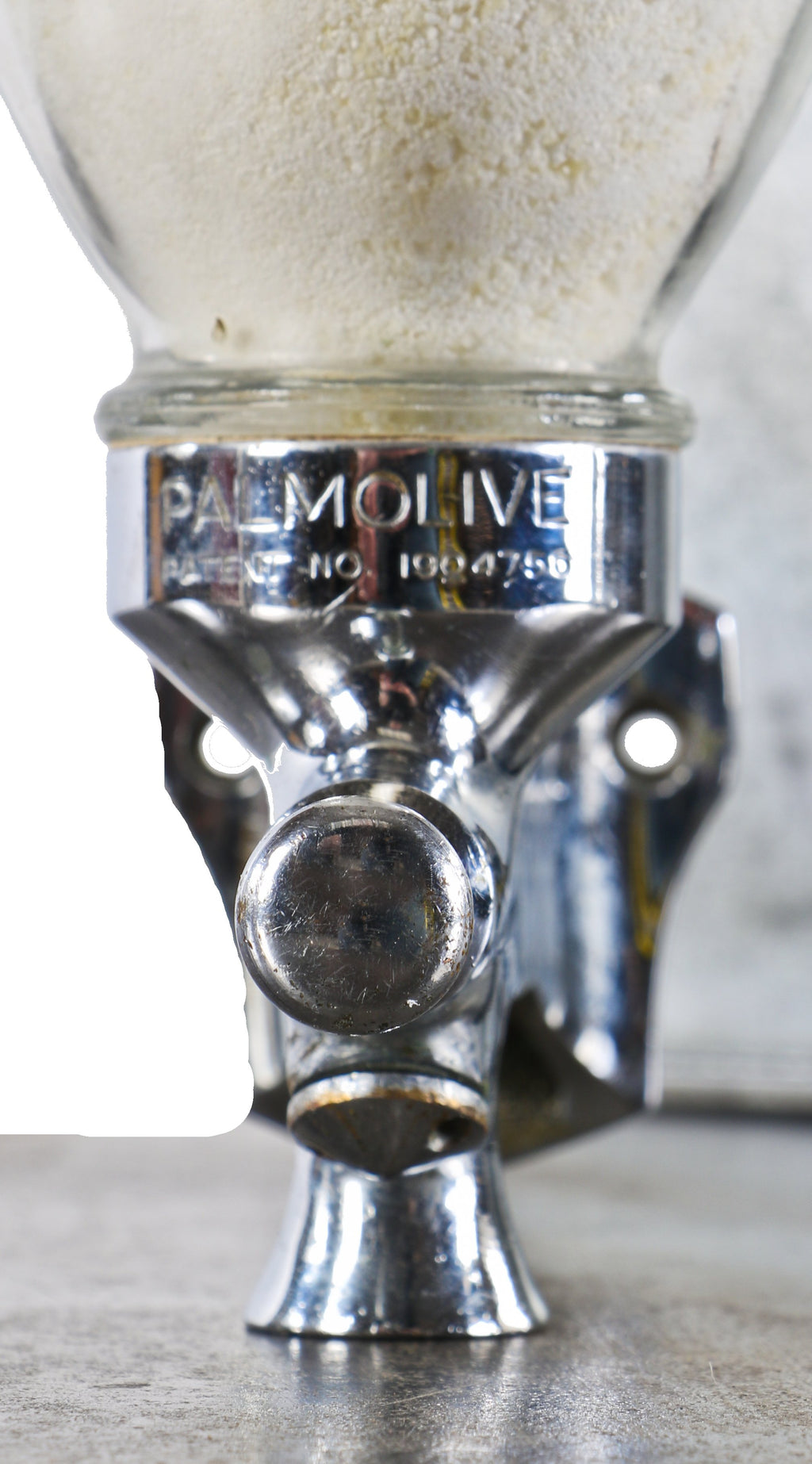 all original and fully functional single-pump action c. 1930's american industrial wall-mount commercial building lavatory "palmolive" brand soap dispenser