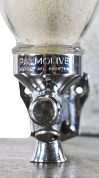 all original and fully functional single-pump action c. 1930's american industrial wall-mount commercial building lavatory "palmolive" brand soap dispenser