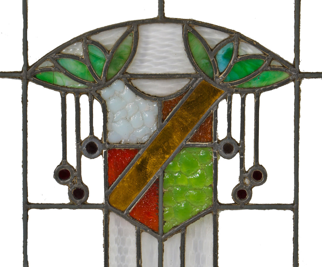 one of several original craftsman style c. 1920's chicago tavern or lodge art glass window featuring a centrally located shield accentuated with gold "flash" glass