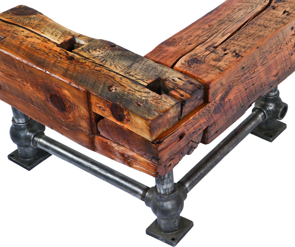 repurposed american industrial l-shaped stationary sitting bench comprised of solid yellow pine wood residential mortise and tenon sill plate beams