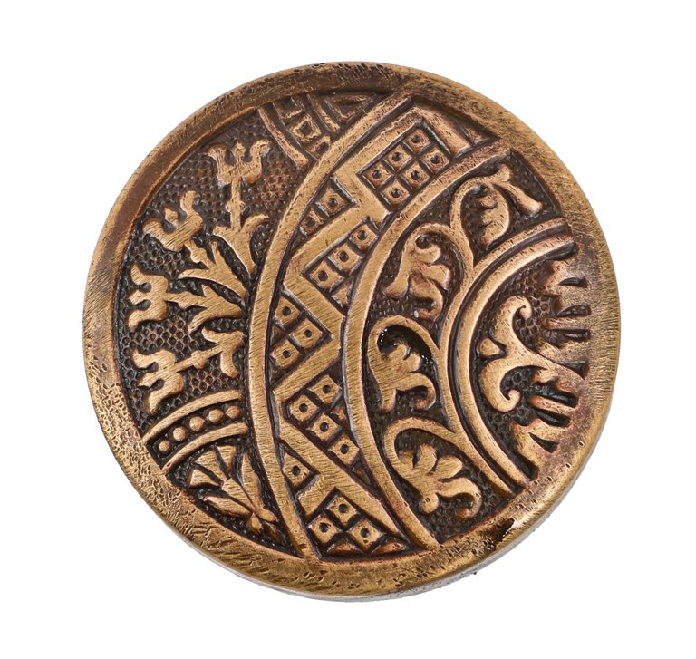one of two matching original 19th century antique american ornamental wrought brass "ceylon" pattern interior residential doorknobs with nicely aged surface patina