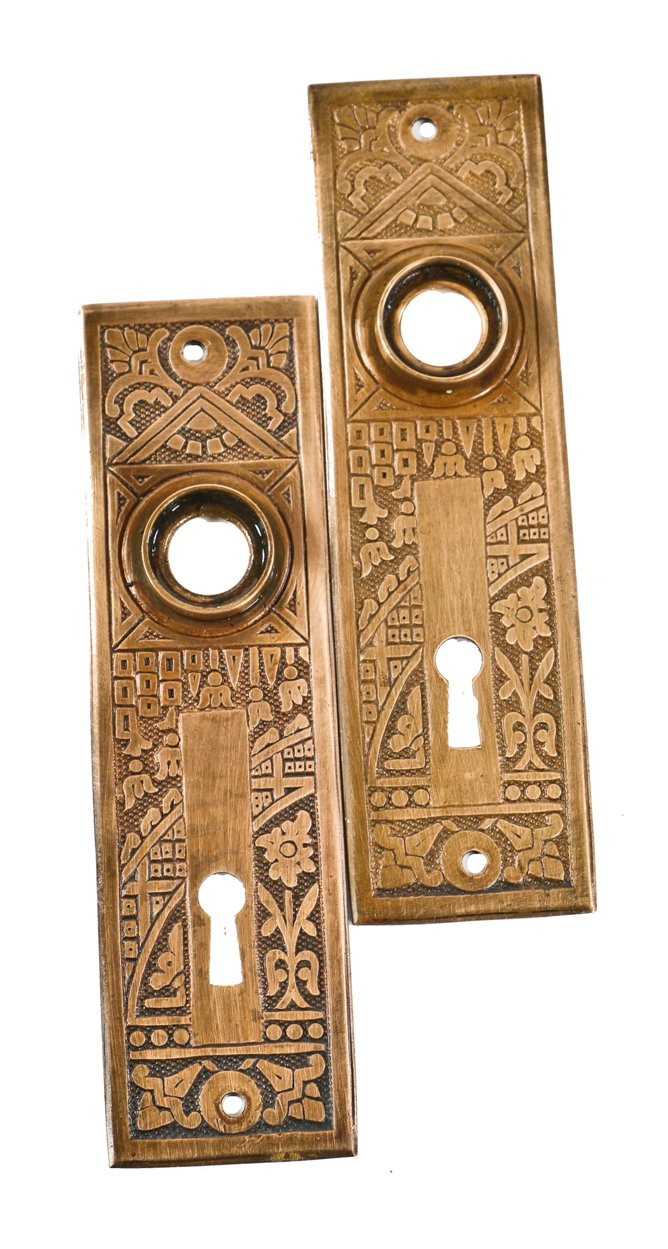 two matching sought after antique american eastlake style ornamental wrought or stamped brass "ceylon" pattern passage door backplates