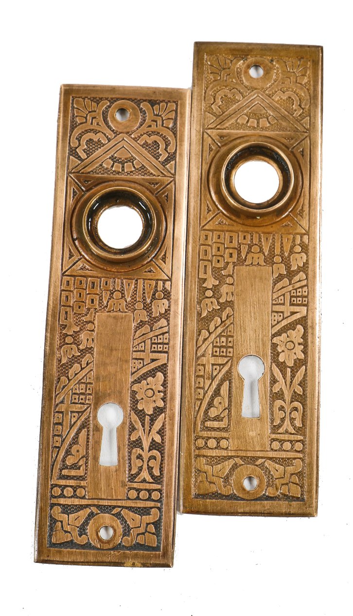 matching set of original 19th century antique american eastlake style "ceylon" pattern residential passage door backplates comprised of wrought brass metal