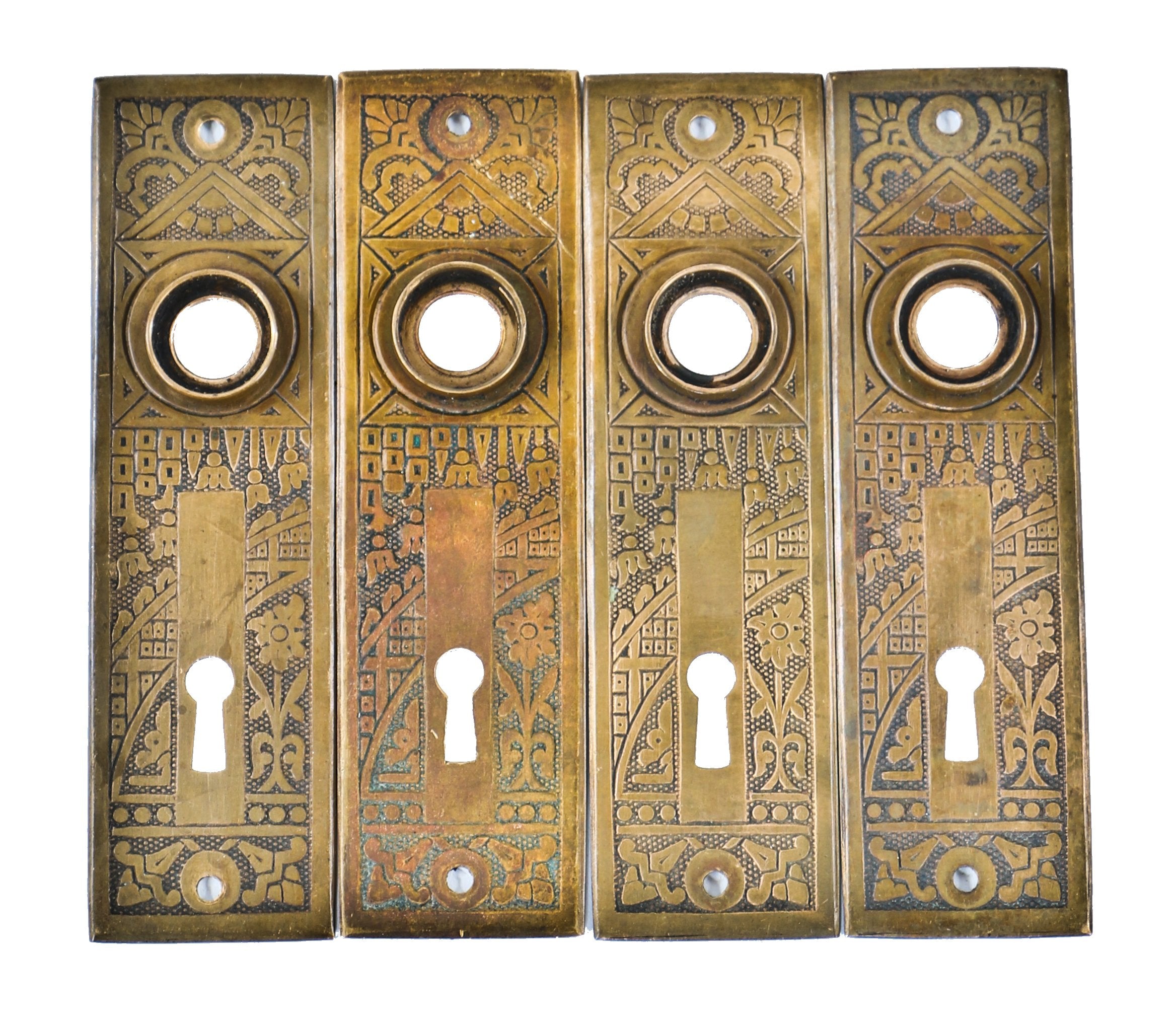 four original and nicely aged highly desirable antique american "ceylon" pattern interior residential passage door backplates or escutcheons comprised of wrought brass