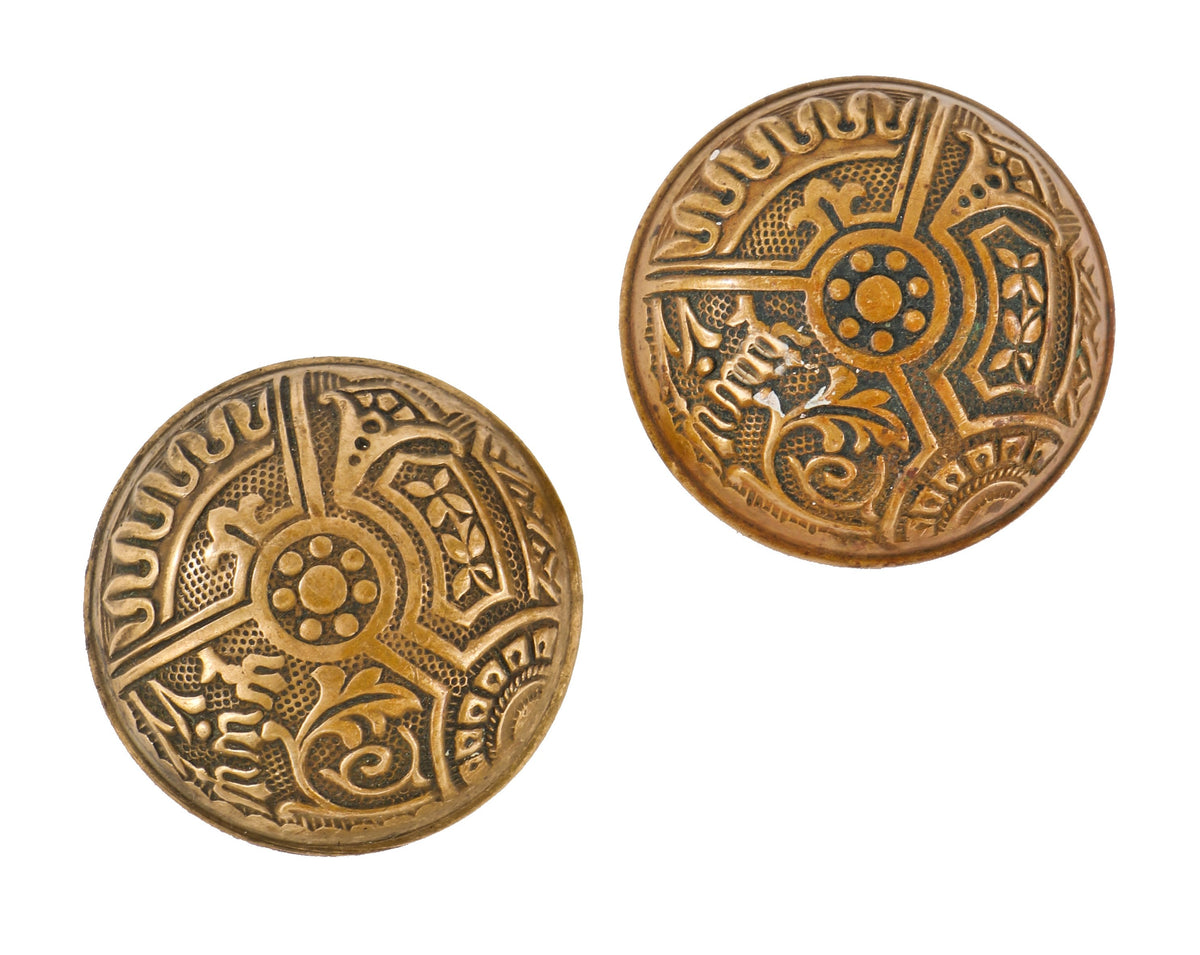 two matching original antique american ornamental wrought brass dome-shaped "ceylon" pattern banded rim doorknobs with nicely aged surface patina