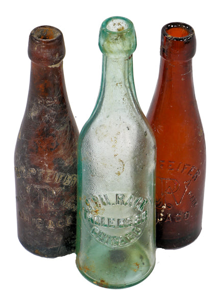 several late nineteenth or early twentieth century beer bottles fabricated for william pfeifer and f.p.h. rack in chicago, il.
