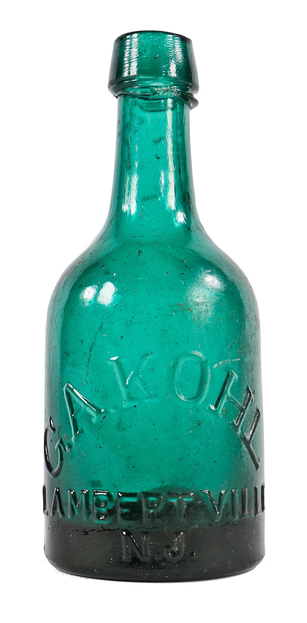 very crude original early 1850's largely intact antique american emerald green glass porter shaped bottle manufactured for george kohl in lambertville, new jersey.