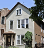 salvaged original c. 1880's interior residential raised panel pine wood varnished passage door with intact "jet black" porcelain doorknobs and ornamental cast iron rosettes