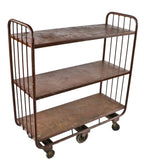original and fully functional c. 1930's american antique industrial depression era drake hotel oversized tubular steel frame mobile utility cart with three shelves