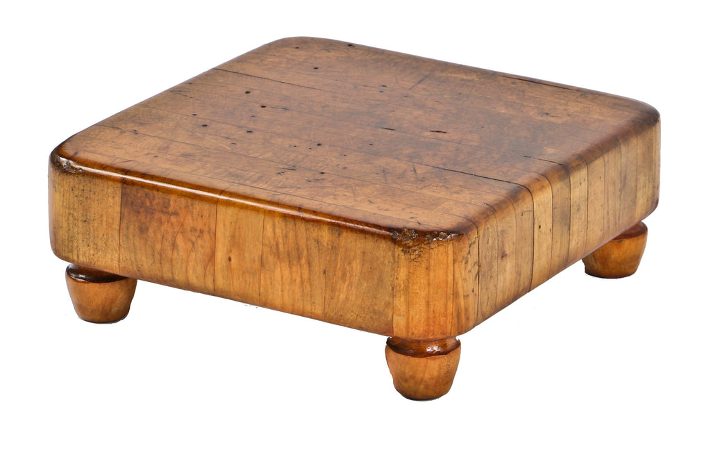 original and very unique diminutive heavy duty late 19th or early 20th century refinished antique american industrial solid maple wood chopping block or board with turned and tapered feet
