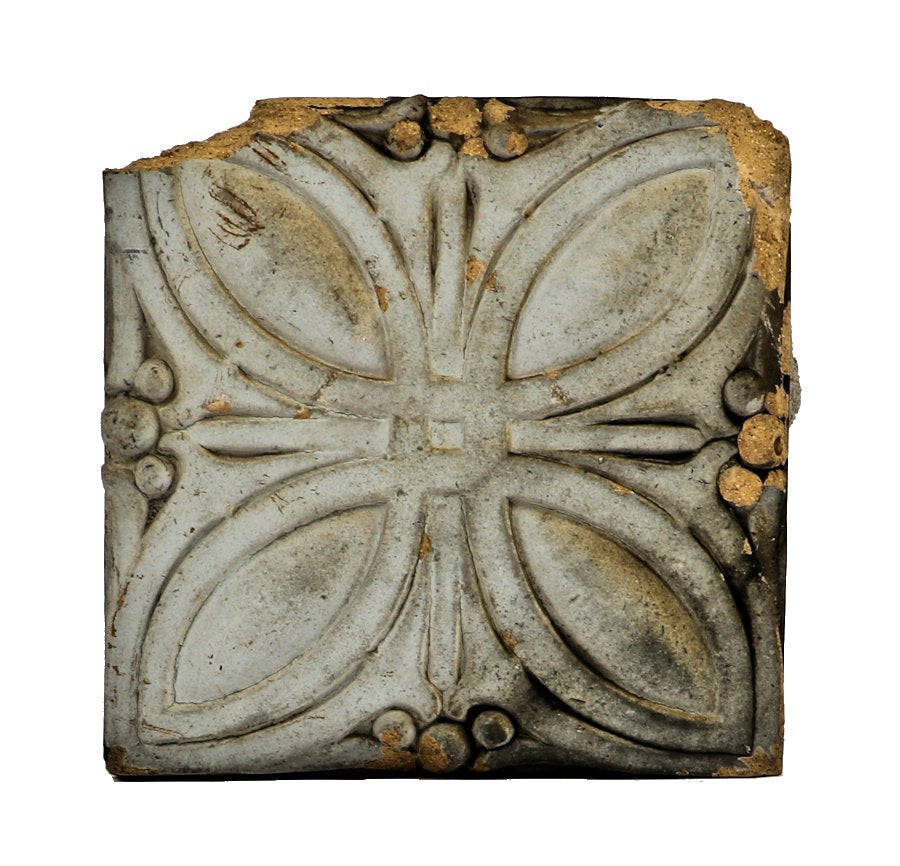 original early 20th century exterior white glazed terra cotta "sullivanesque" style exterior chicago garage salvaged facade element with discoloration