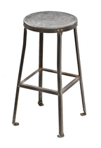 structurally sound and heavily reinforced late 1920's american antique industrial riveted-joint heavy gauge angled steel four-legged elevator machine room stool with brushed metal finish