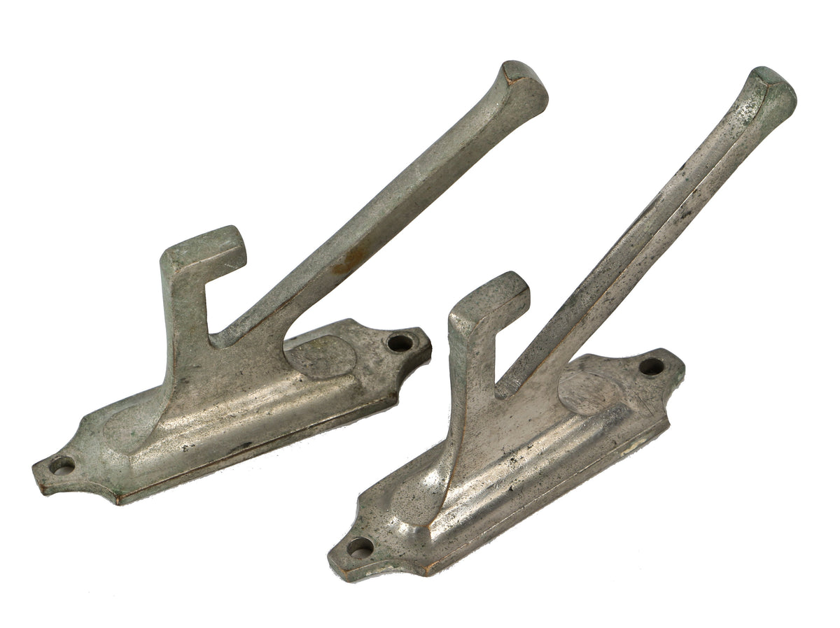 pair of original antique american c. 1940's zephyr passenger train wall-mounted "garcy" cast bronze coat or garment hooks with original nickel-plated finish intact