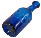 original intact privy dug mid-nineteenth century iron pontiled dark "electric blue" soda or mineral water bottle manufactured for burroughs wellcome & co., new york city, ny.