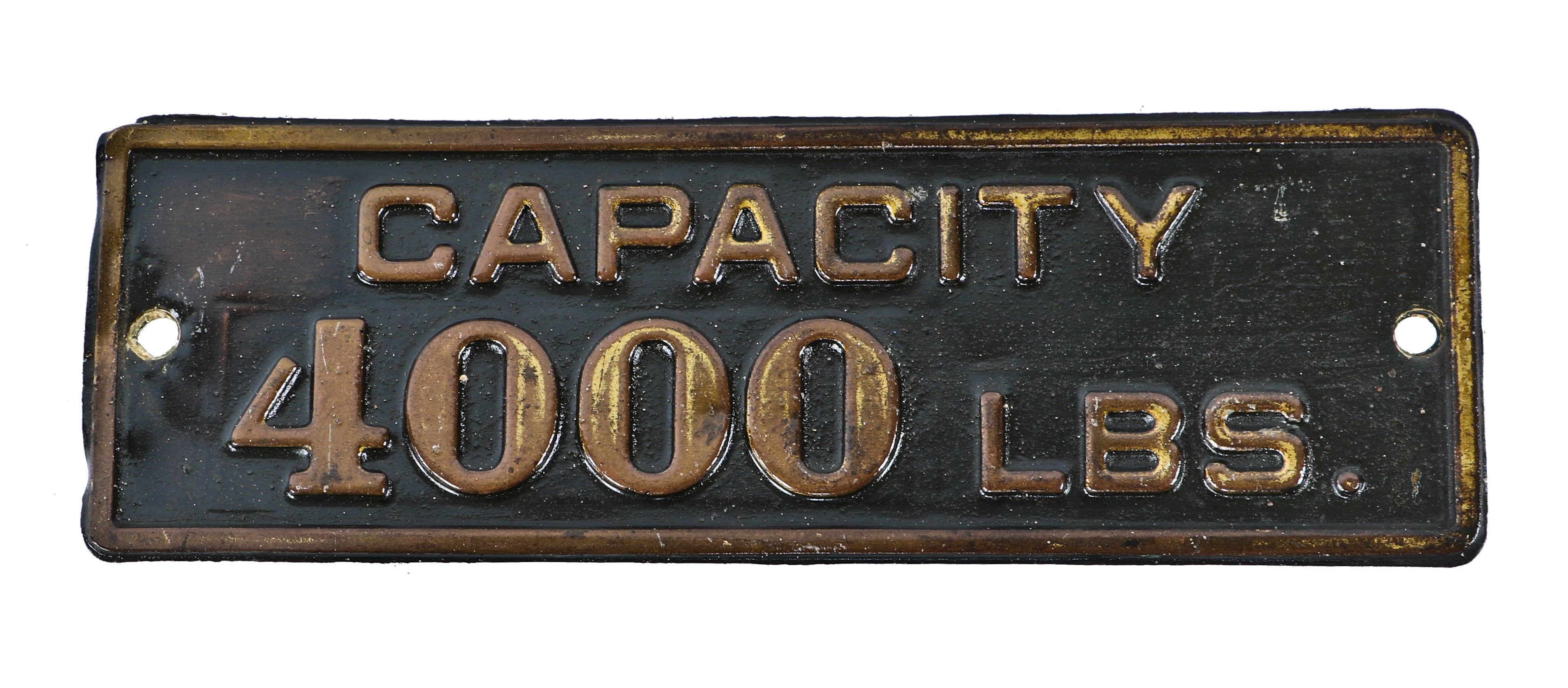 single-sided c. 1918 antique american industrial single-sided stamped steel factory freight elevator "4000lbs capacity car or cab informational sign with faint brass plating