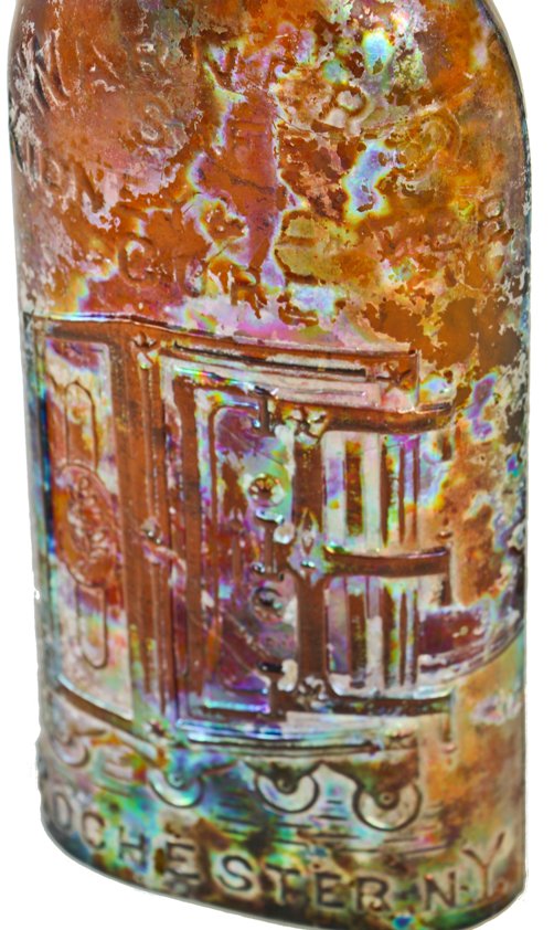 intact late nineteenth century chicago privy-dug amber flask shaped medicine bottle of "warner's safe kidney cure" manufactured for hulbert harrington warner